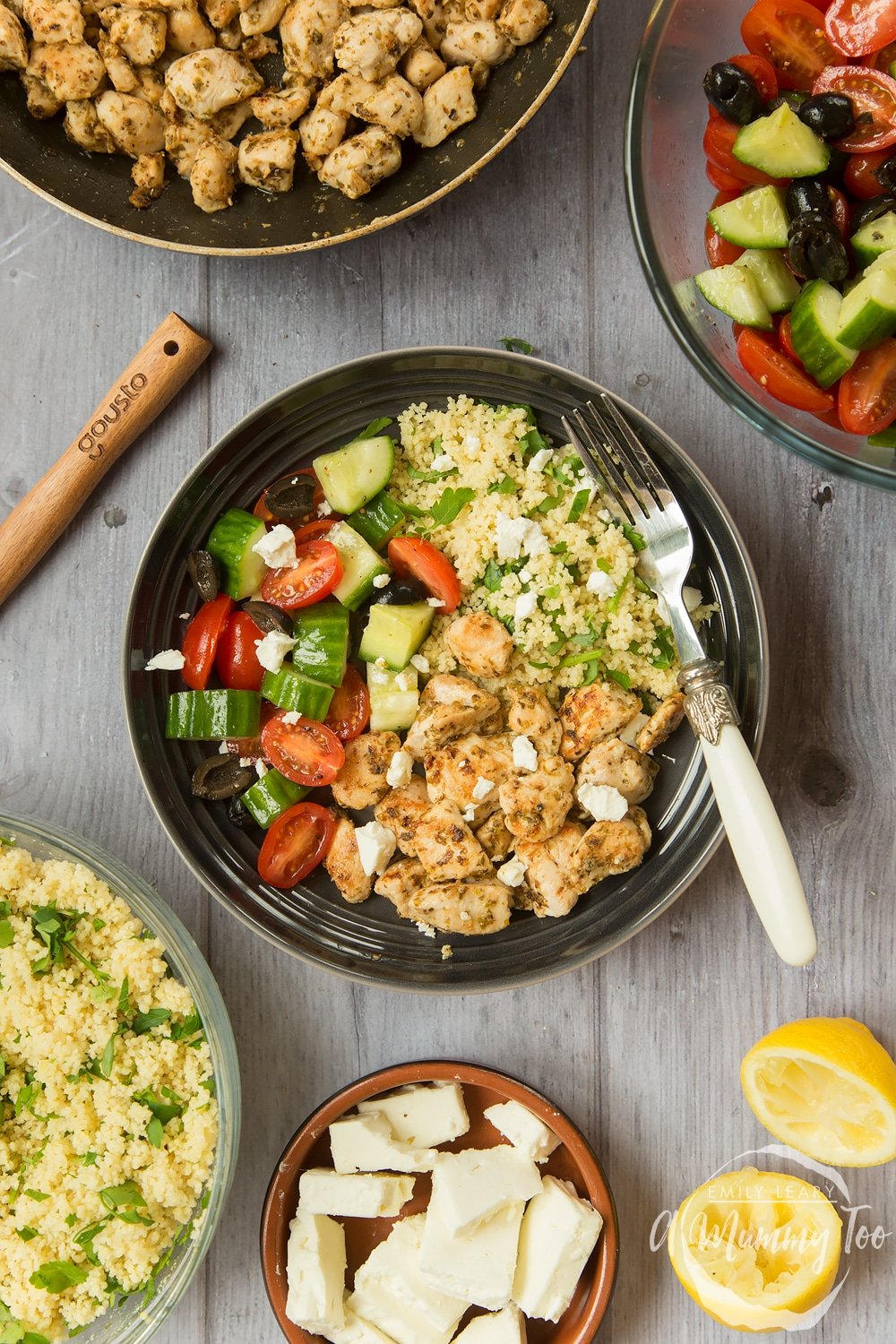 Speedy Greek chicken salad with seasoned chicken, salad and herby couscous