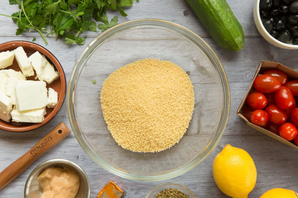 Dried couscous in a glass bowl