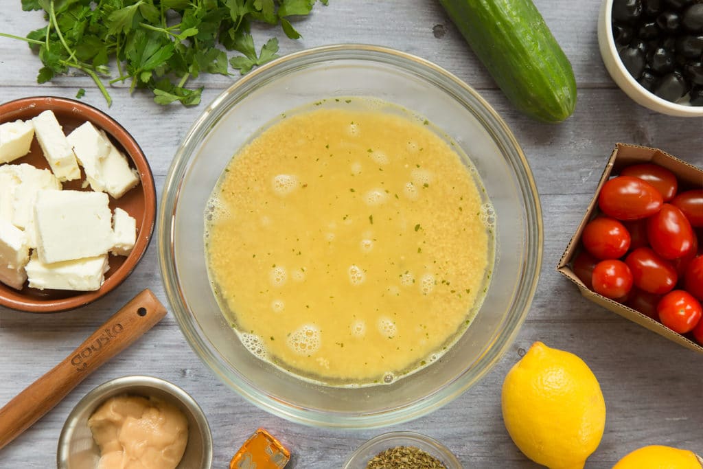 Cooked couscous in a glass bowl