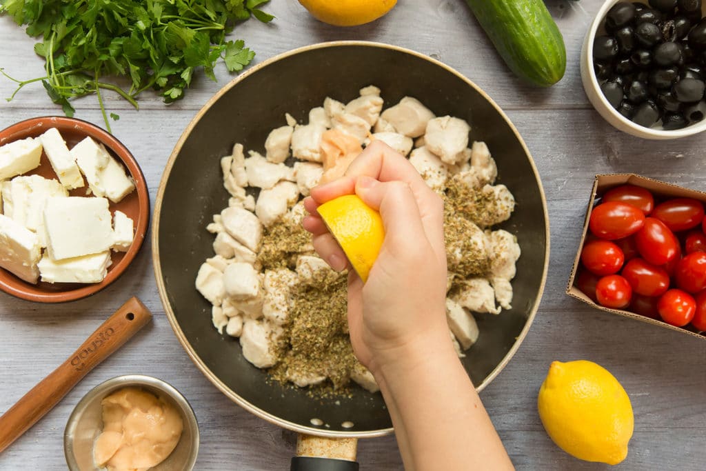 Squeeze a lemon over the cooking chicken