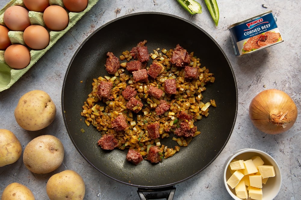 Add the corned beef to the frying pan and brown