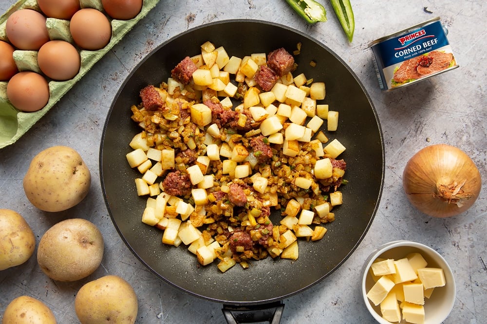 Corned beef mix frying in a pan 