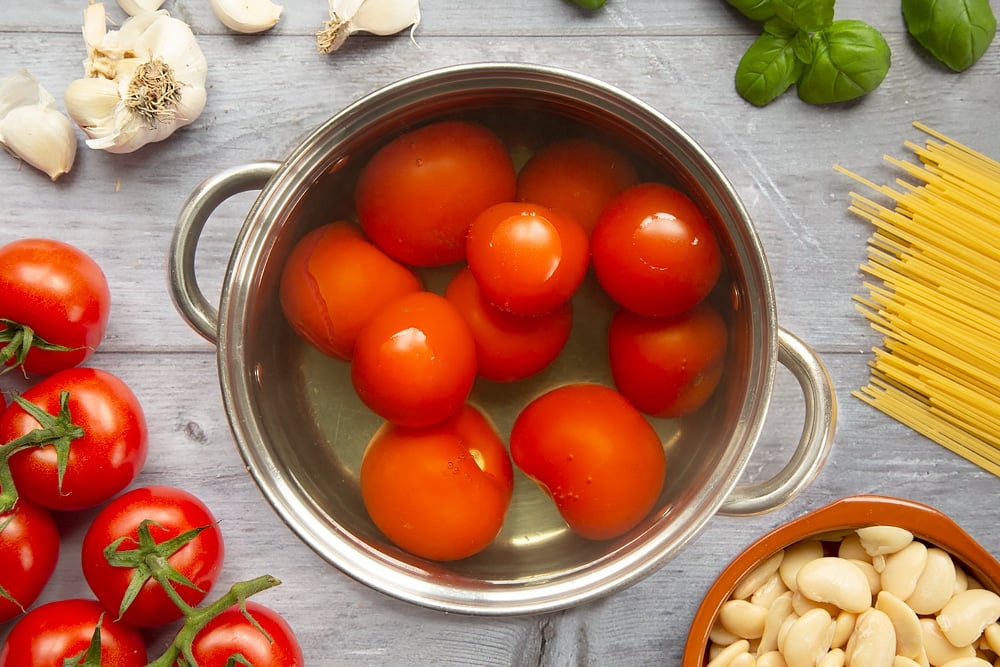 Tomatoes boiling in a saucepan