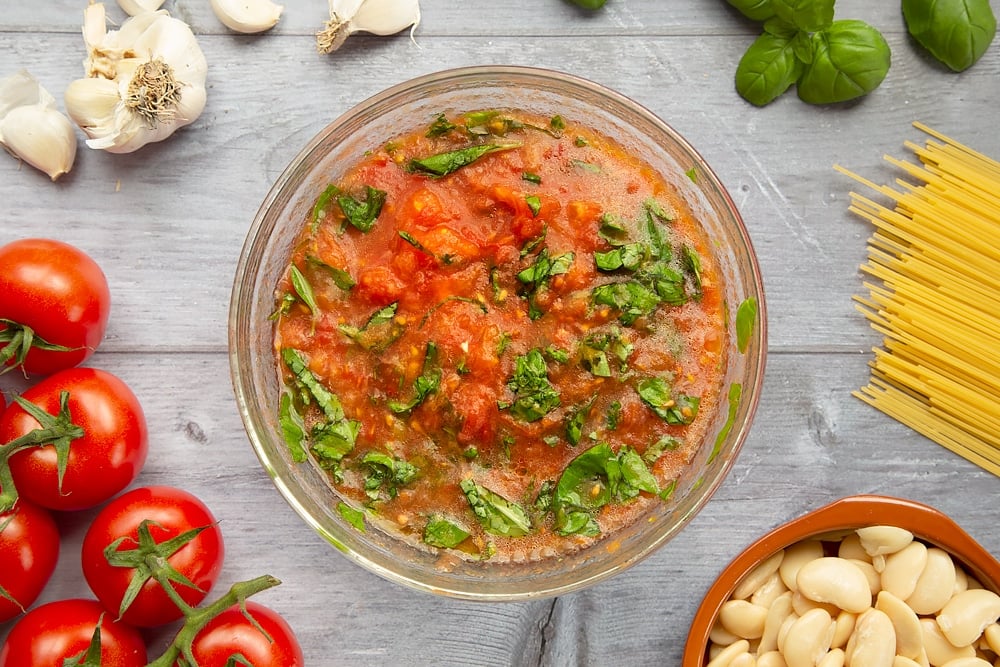 Mixing the tomato and garlic sauce together