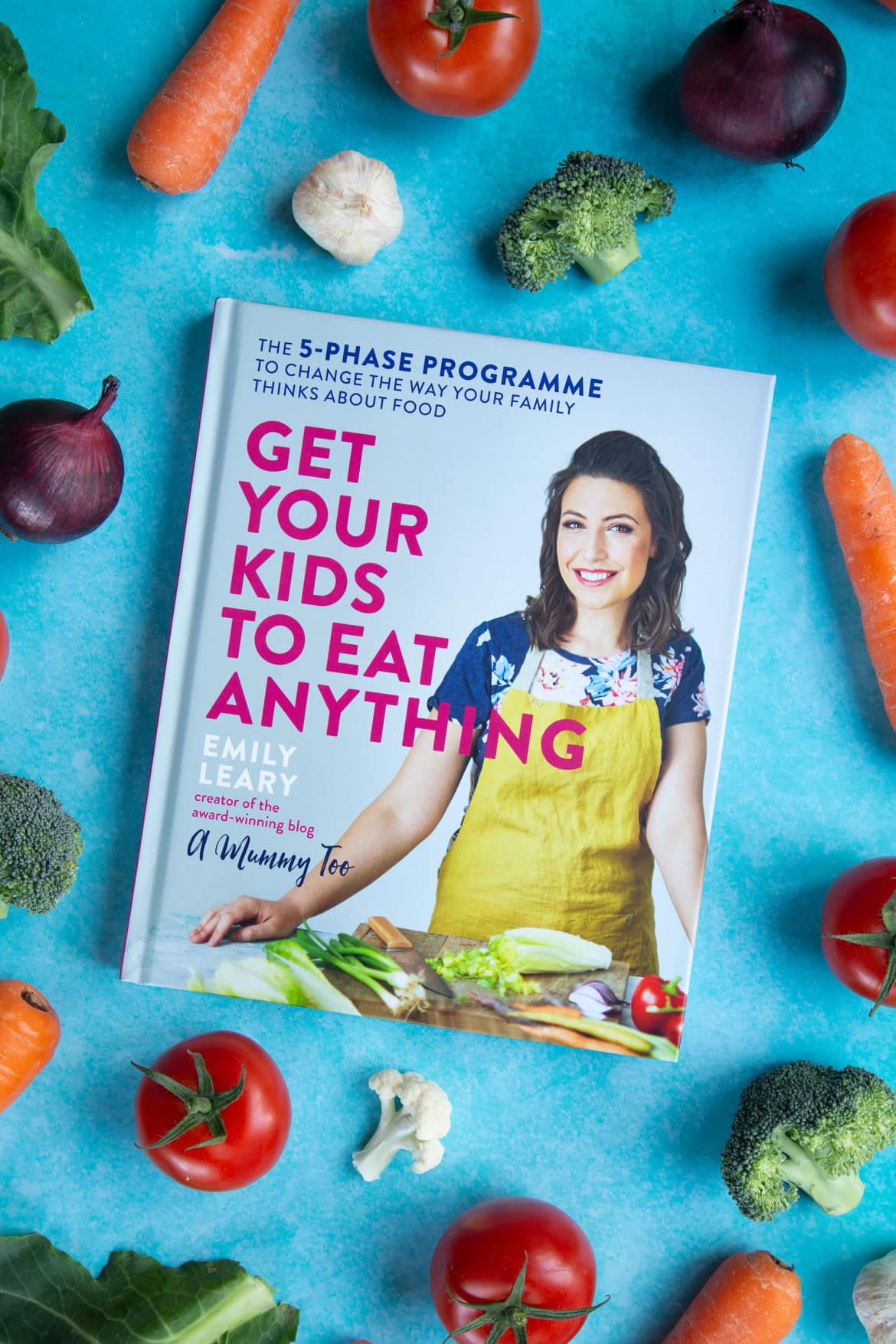 Overhead shot of a cookbook of Get Your Kids To Eat Anything by Emily Leary