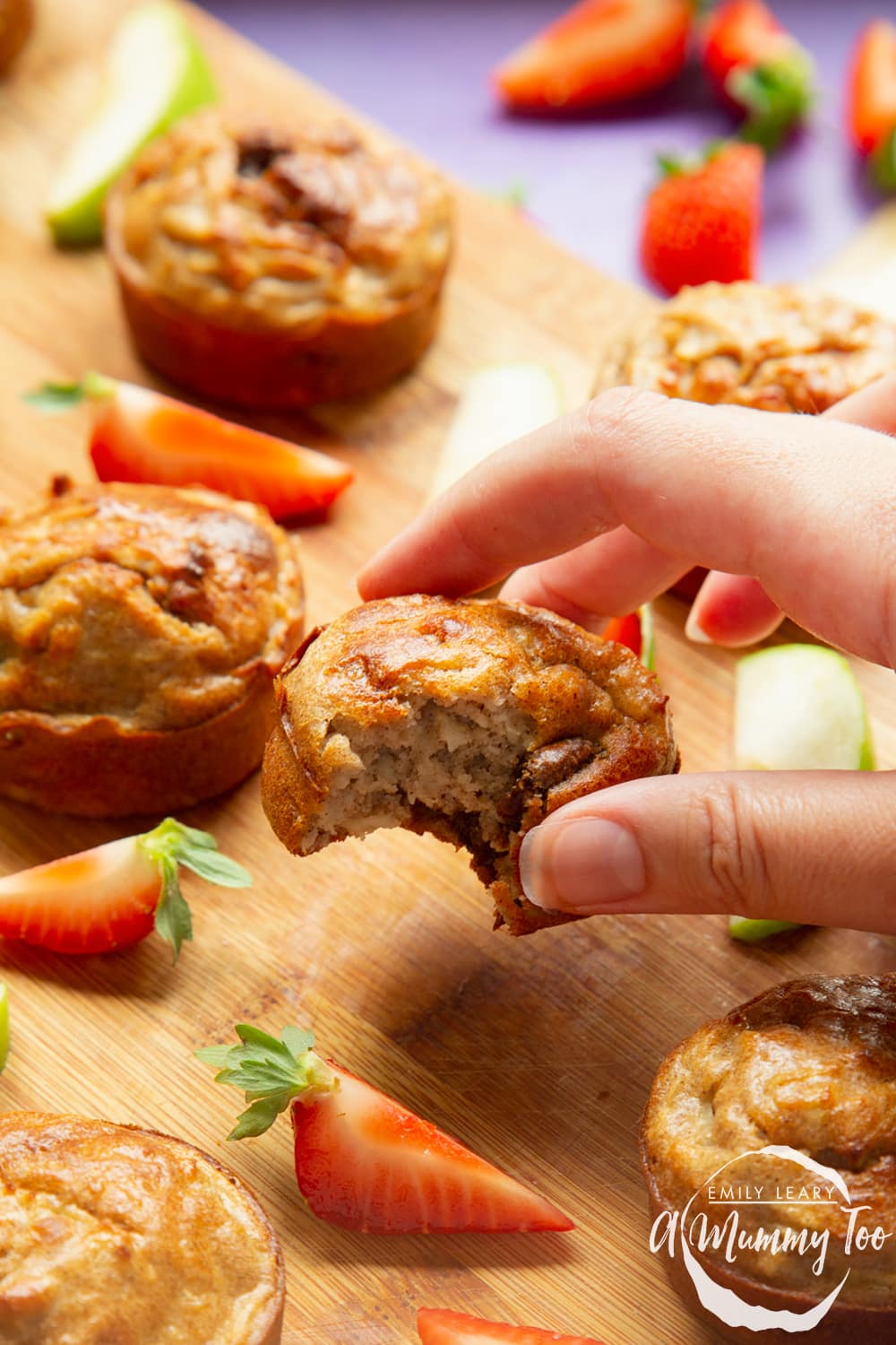 No junk apple and strawberry muffins - inner crumb shown as muffin is held