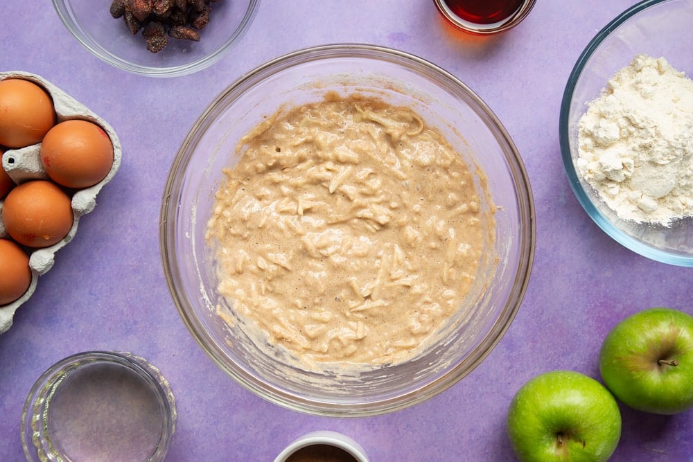 No junk apple and strawberry muffins - batter a bowl.