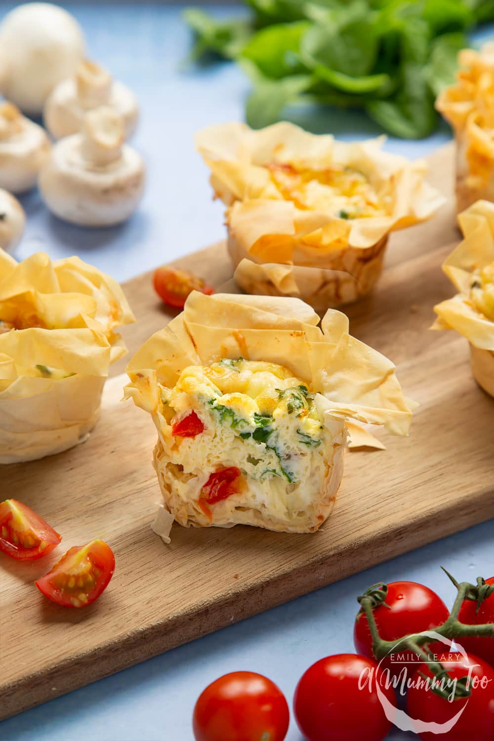 Filo pastry mini quiches - cut open to show the cooked filling.