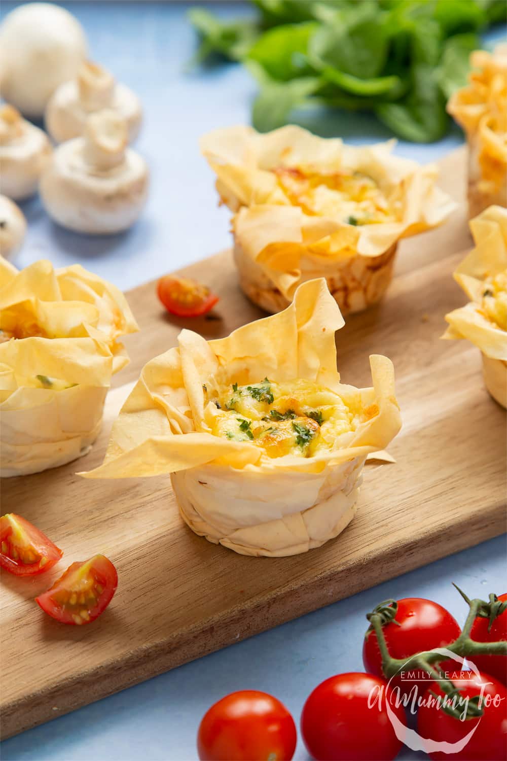 Filo pastry mini quiches - cooked and on board.