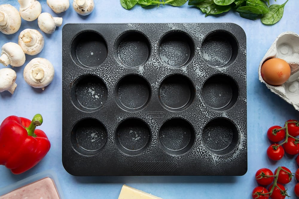 Filo pastry mini quiches - oiled muffin tray.