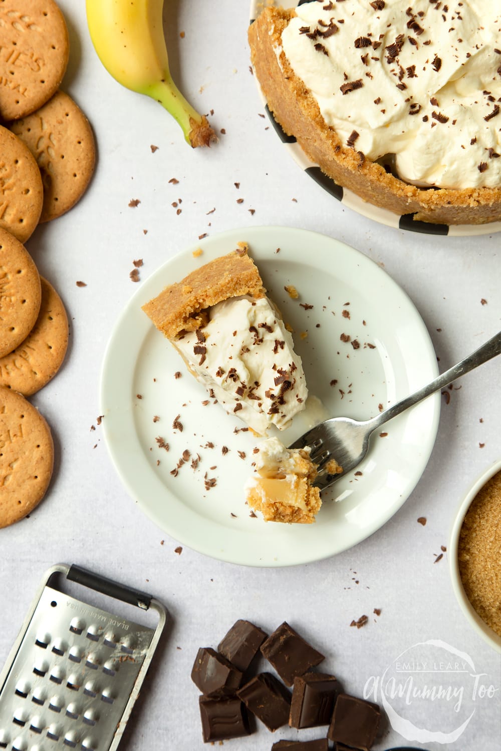 The perfect classic banoffee pie recipe. Slice on plate and a piece on the fork