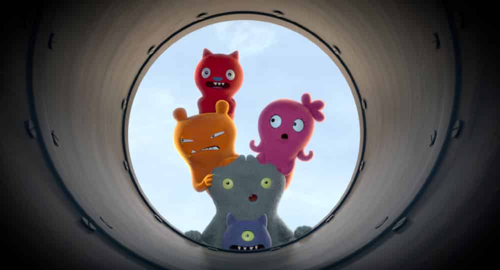 UglyDolls Movie - a still showing the UglyDolls looking down a tunnel