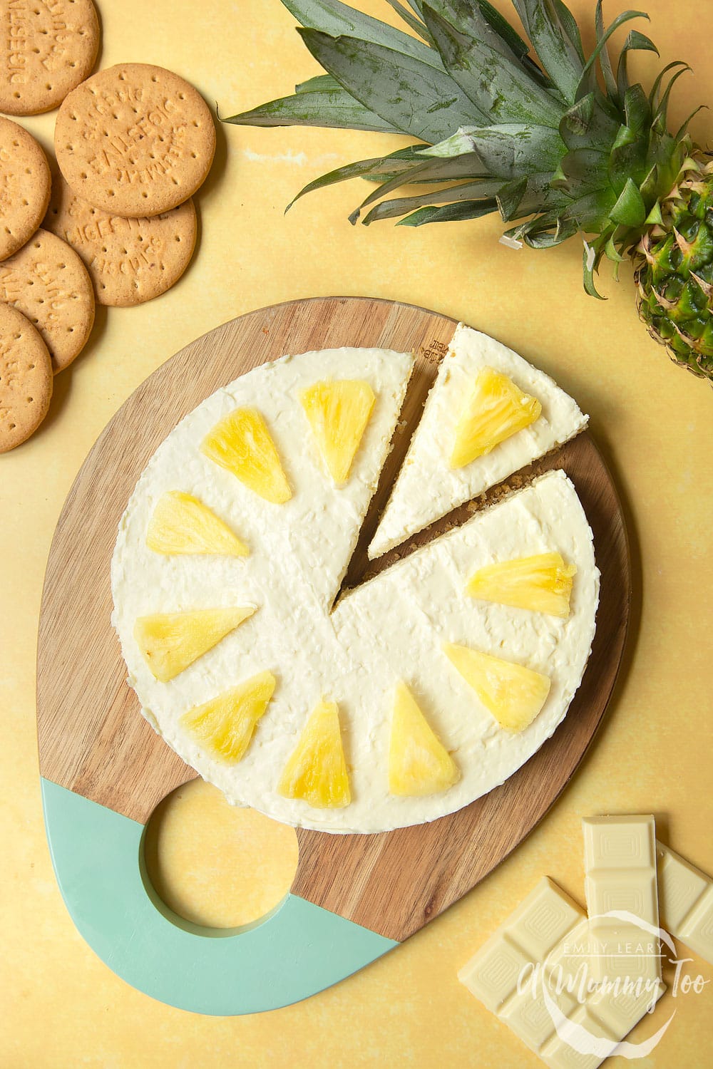 Extra special no-bake coconut cheesecake topped with pineapple pieces.