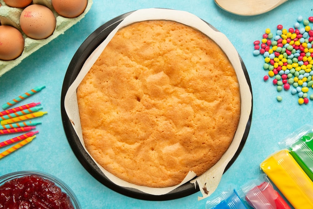 Freshly baked Victoria sponge, still in its tin