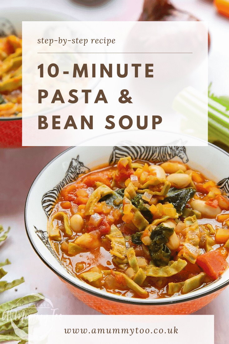 A bowl of cooked pasta e fagioli set on a table, another bowl is also being served on the table.