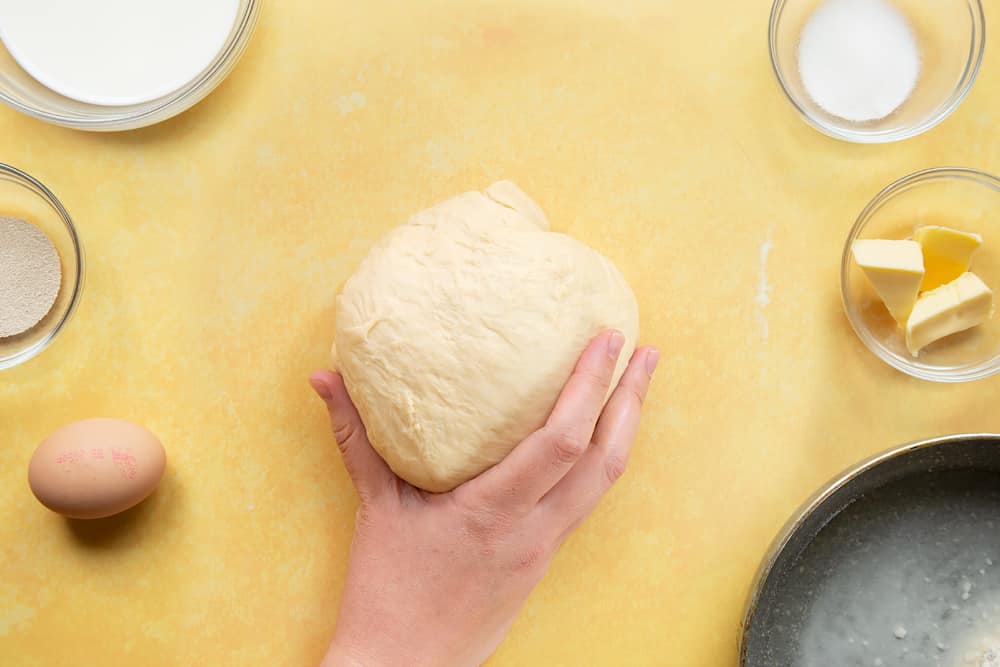 Tangzhong bread dough knocked back and kneaded into a ball