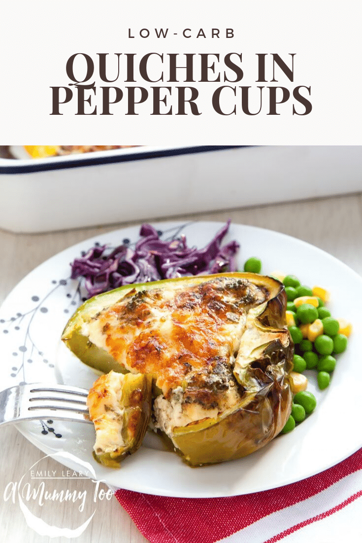 Fork going into a quiche pepper cup with a side of veg on a decorative plate on a white wooden background.