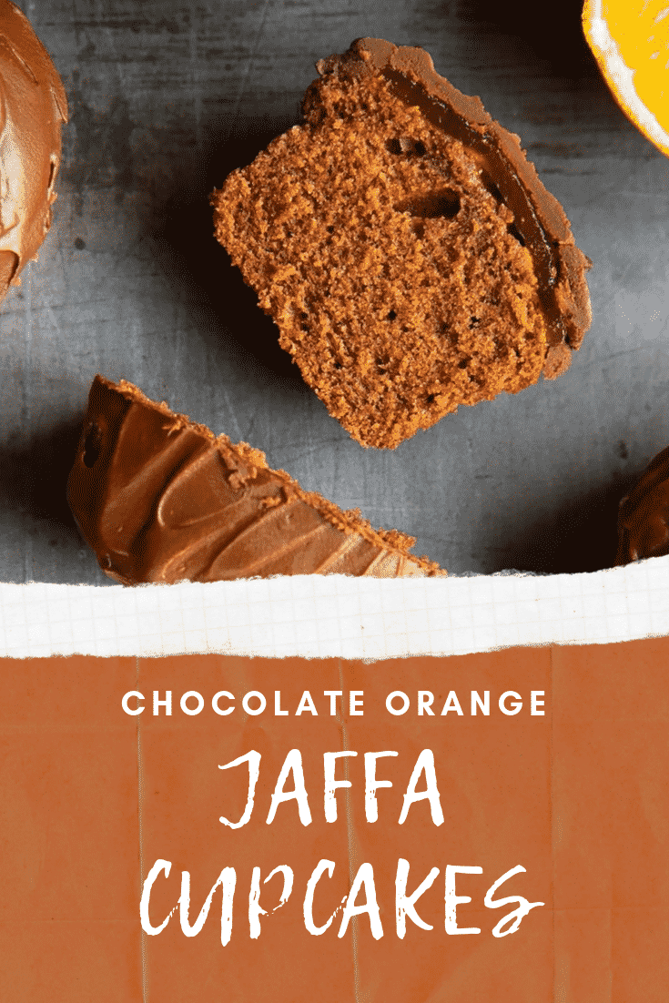 Close up shot of the inside of chocolate orange jaffa cupcakes. At the bottom of the image there's some white text on a brown background describing the image for Pinterest. 