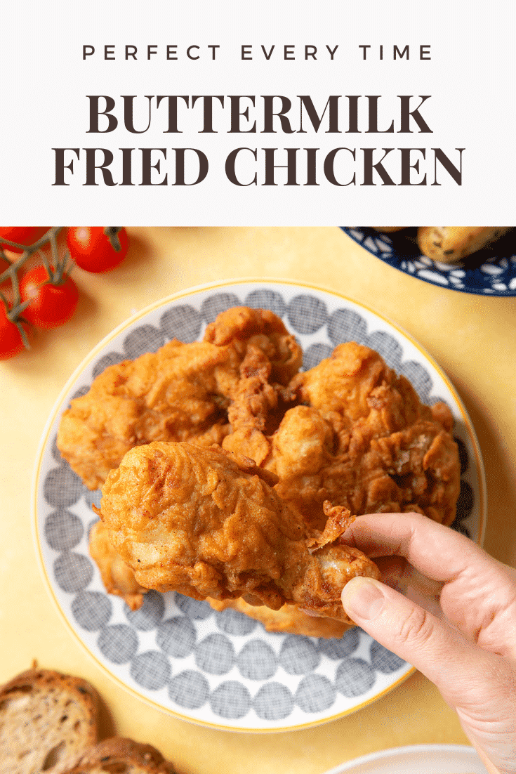 Gordon Ramsay’s buttermilk fried chicken arranged on a plate. A hand holds a well-coated drumstick, with a golden seasoned coating. A heading states, Perfect Every Time Buttermilk Fried Chicken.
