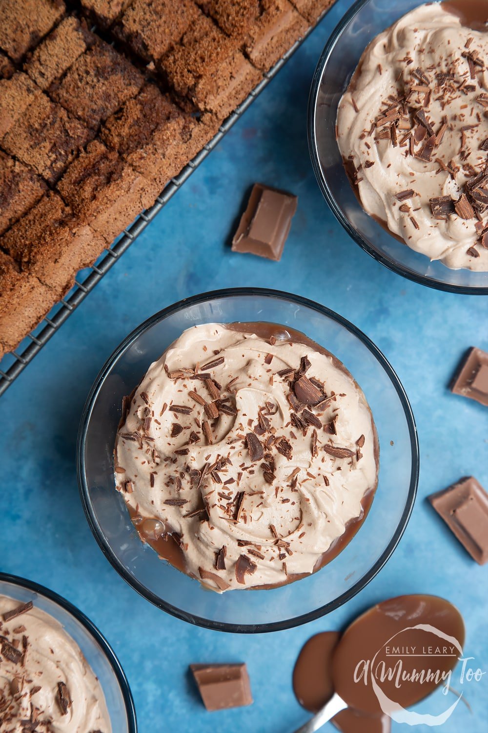 Overhead view of the baileys triple chocolate trifle with melted chocolate on the side. 