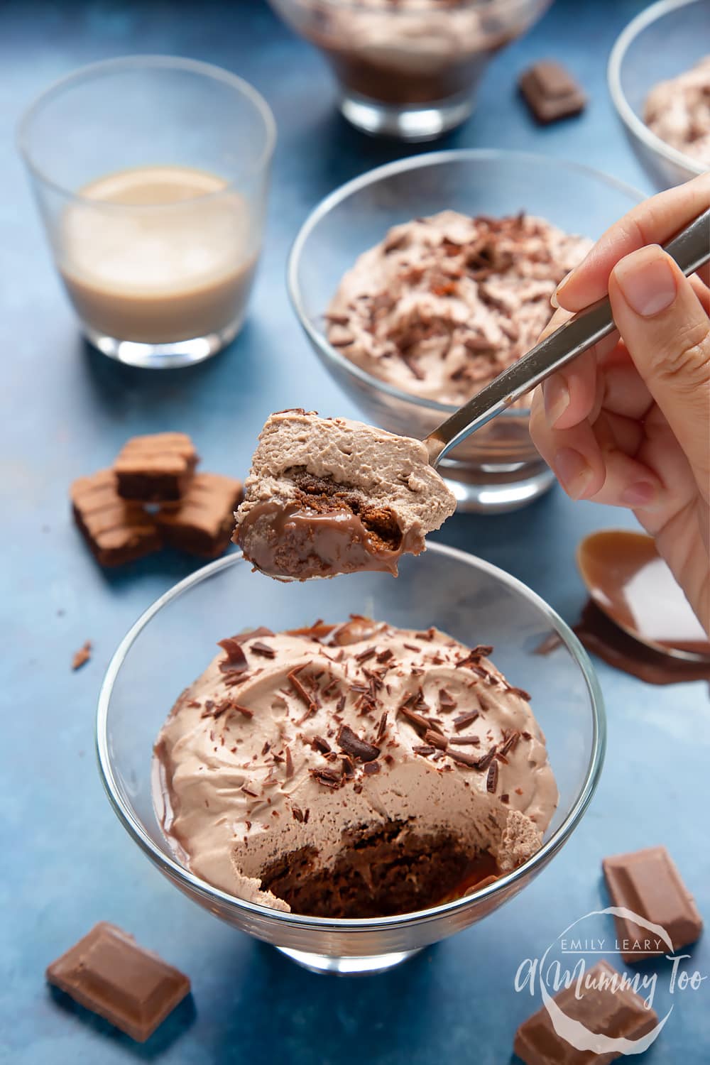 A spoon filled with baileys triple chocolate trifle