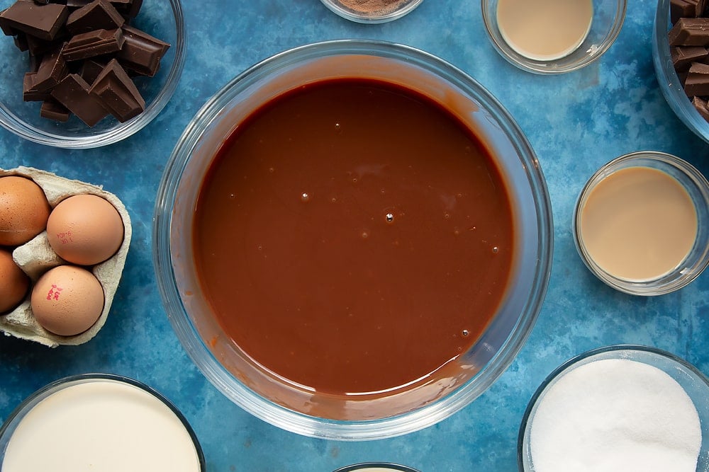 The baileys triple chocolate trifle's ganache ingredients having being heated in the microwave.