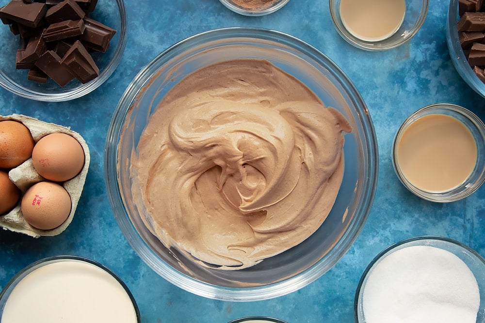 The baileys triple chocolate trifle cream topping ingredients mixed together.