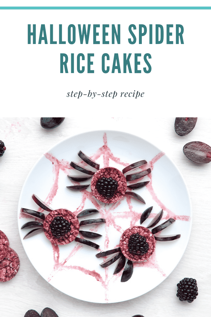 Halloween rice cakes, decorated with blackberries & grapes to look like spiders on a spider's web. Caption reads: Halloween spider rice cakes. Step-by-step recipe.