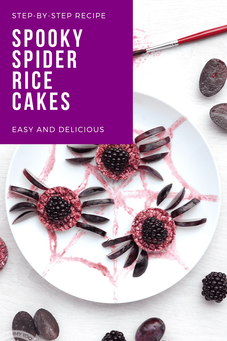 Halloween rice cakes, decorated with blackberries & grapes to look like spiders on a spider's web. Caption reads: Step-by-step recipe. Spooky Halloween spider rice cakes. Easy and delicious.