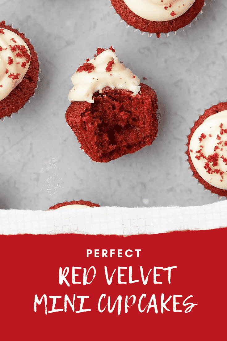 Sidewards overhead shot of a Mini red velvet cupcakes with cream cheese frosting on a grey table with white text describing the image for Pinterest at the bottom. 