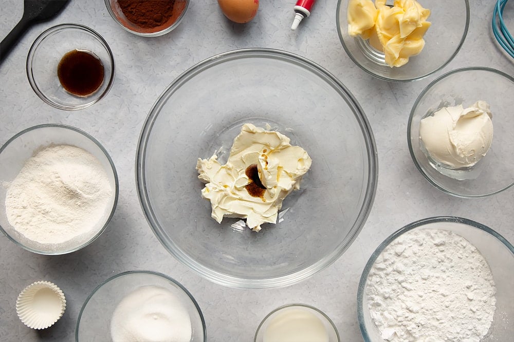 Overhead shot of mixing together ingredients for the cream cheese frosting.
