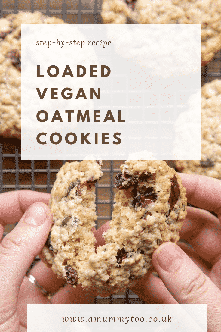 A hand holds a vegan oat cookie and is breaking it open. Caption reads: step-by-step recipe loaded vegan oatmeal cookies