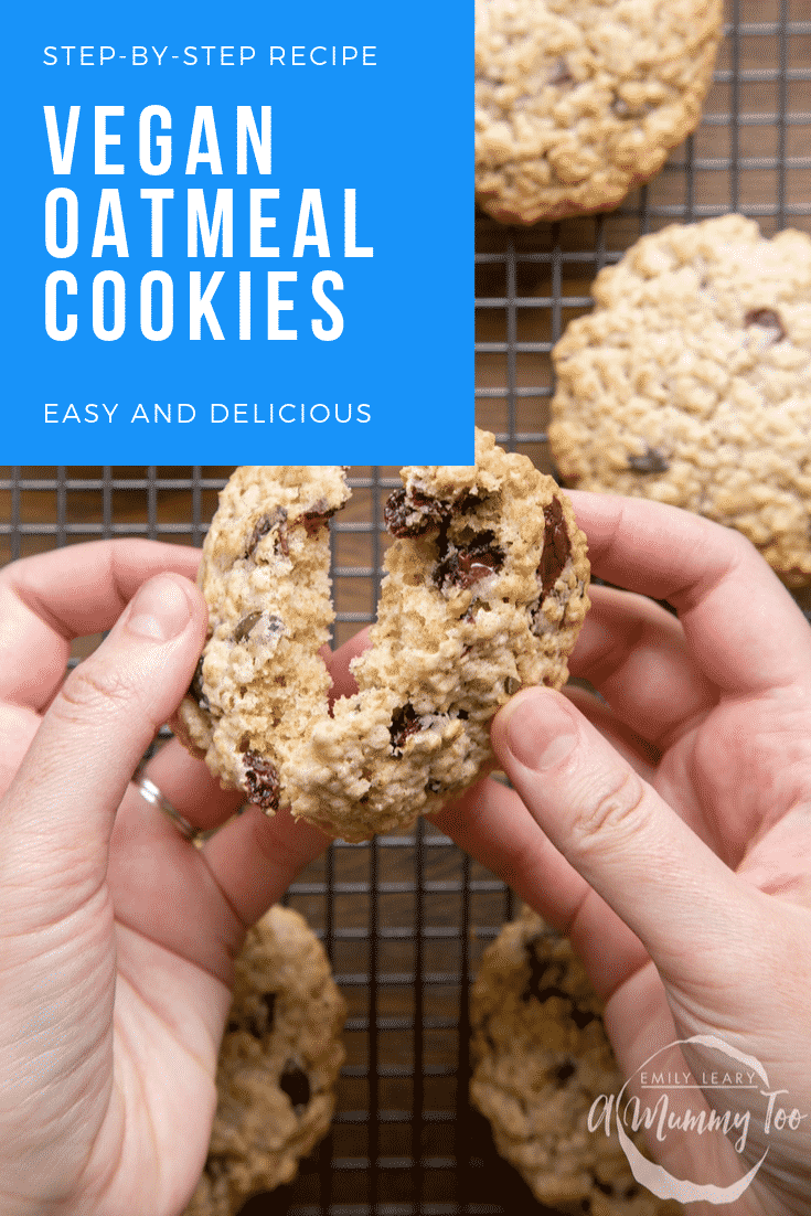 A hand holds a vegan oat cookie and is breaking it open. Caption reads: step-by-step recipe vegan oatmeal cookies easy and delicious