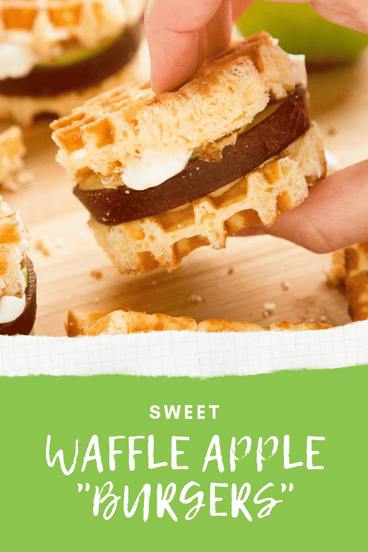 Zoomed in shot of a hand holding as apple waffle burger above graphic text SWEET WAFFLE APPLE "BURGERS"