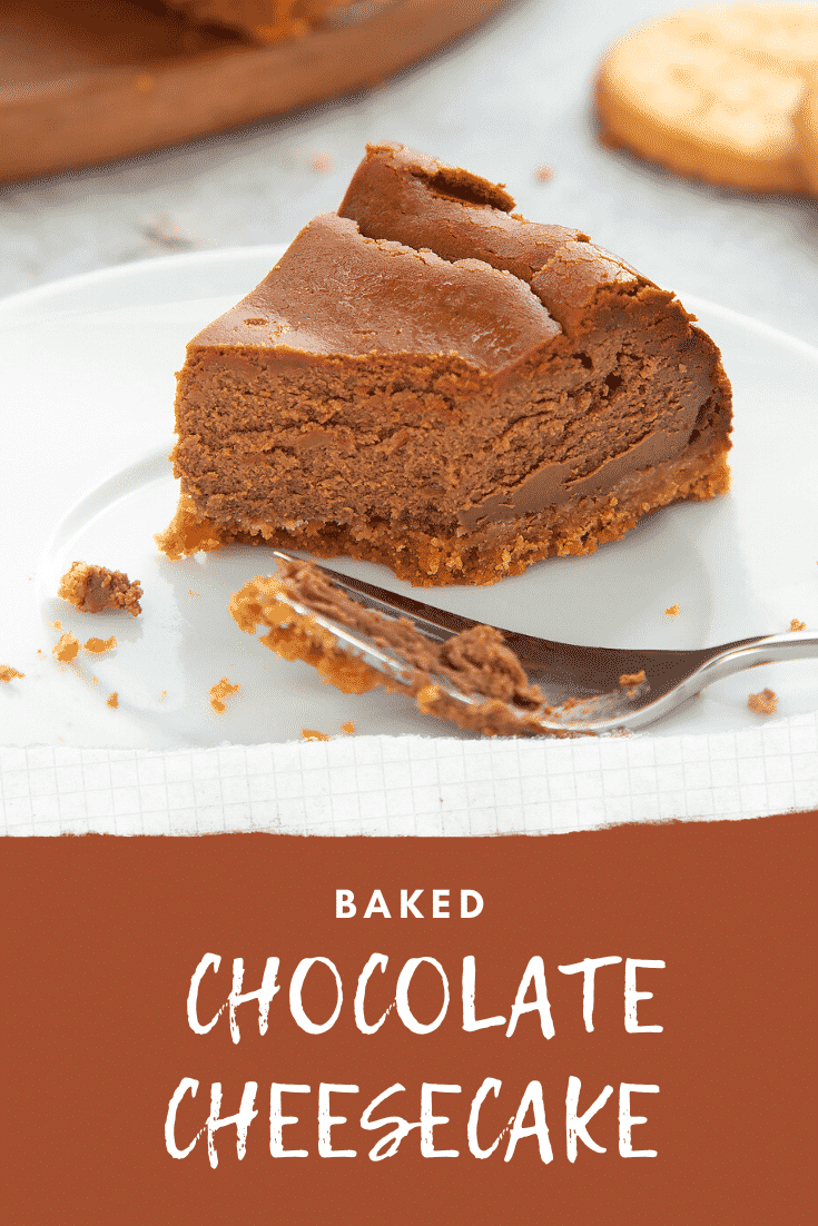 A half eaten slice of baked chocolate cheesecake on a white plate with a fork on the side. At the bottom of the image there's some white text on a brown background describing the image for Pinterest. 