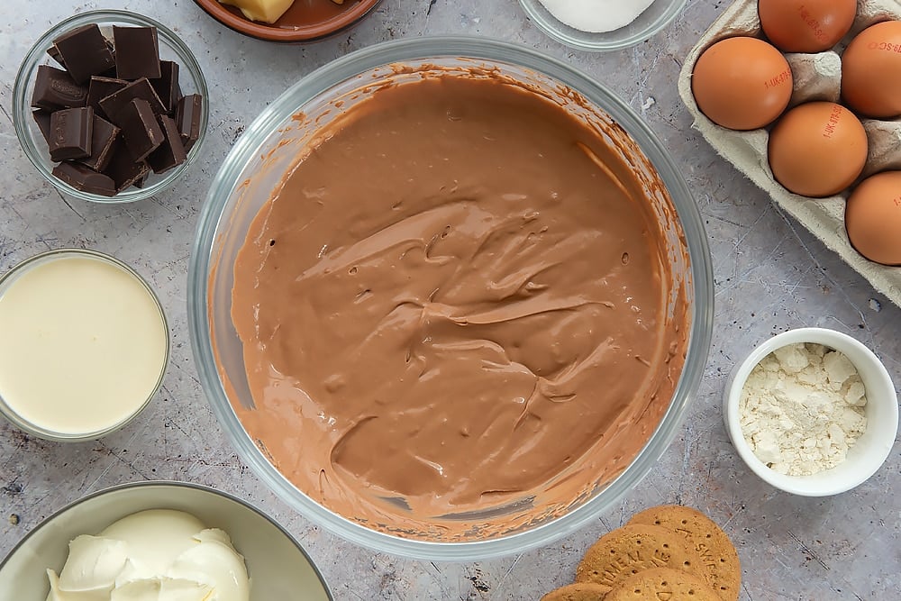 Overhead shot of the finished chocolate cheesecake mixture in a Pyrex bowl.