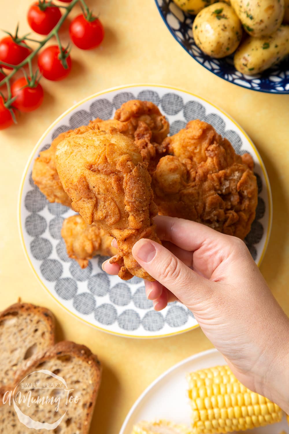 Gordon Ramsay’s buttermilk fried chicken arranged on a plate, surrounded by salad.