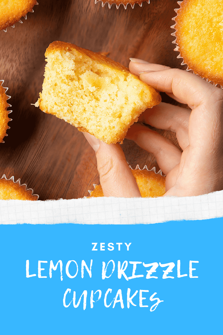 A hand holding a lemon drizzle cupcake above a dark wooden board. Caption reads: zesty lemon drizzle cupcakes