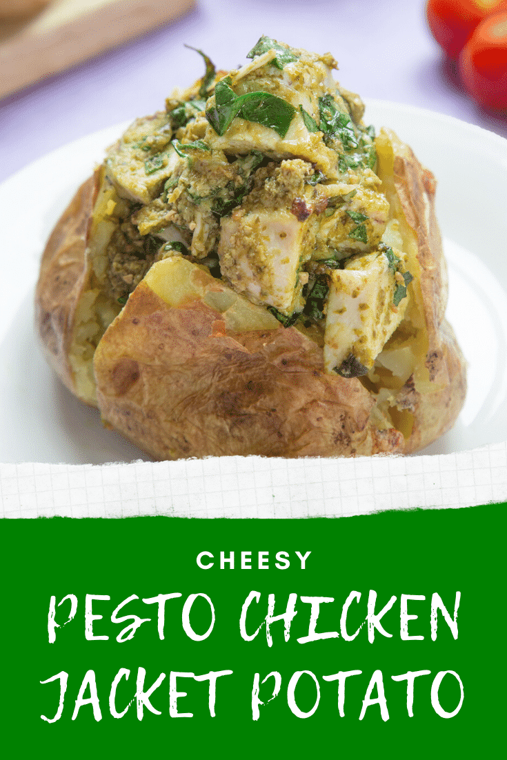 A jacket potato with cheesy pesto chicken on a white plate. Caption reads: cheesy pesto chicken jacket potato