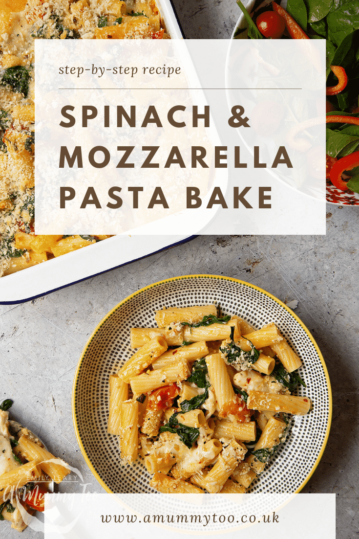 Overhead shot of Cherry tomato, spinach and garlic mozzarella pasta bake in a bowl. At the top of the image there's some text describing the image for Pinterest. 