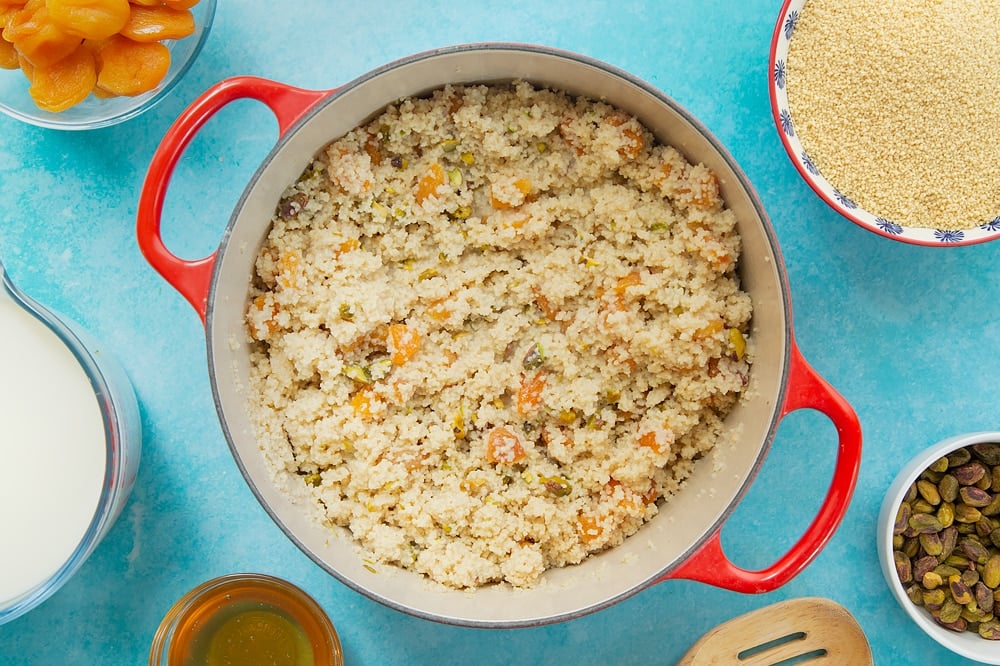 Stirring through the remaining ingredients just added to the sweet breakfast couscous. 