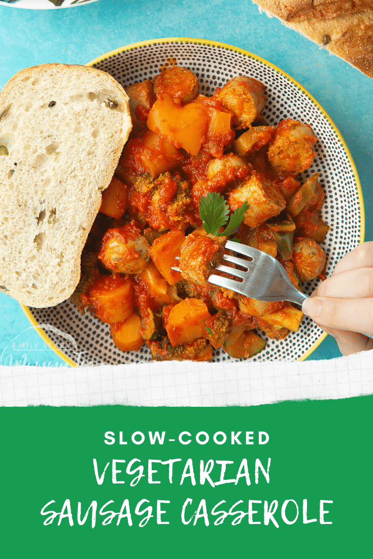 Overhead shot of the Slow-cooked vegetarian sausage casserole in a decorative bowl. At the bottom of the image there's some white text on a green background describing the image for Pinterest.