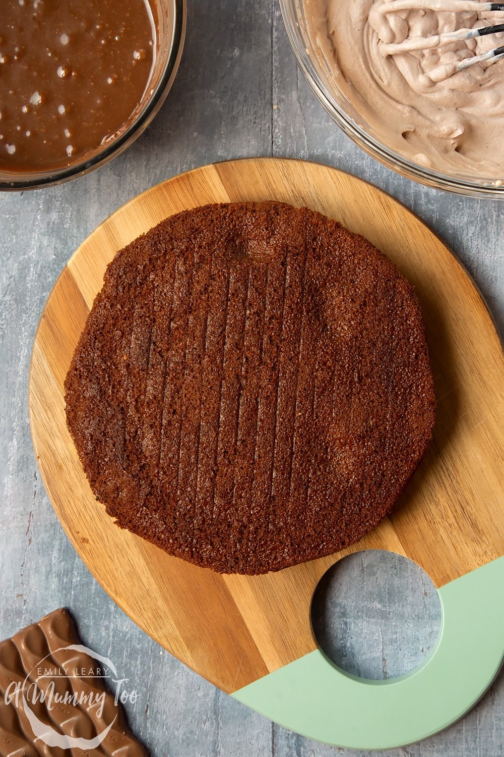 Baked galaxy chocolate cake being left cooling.