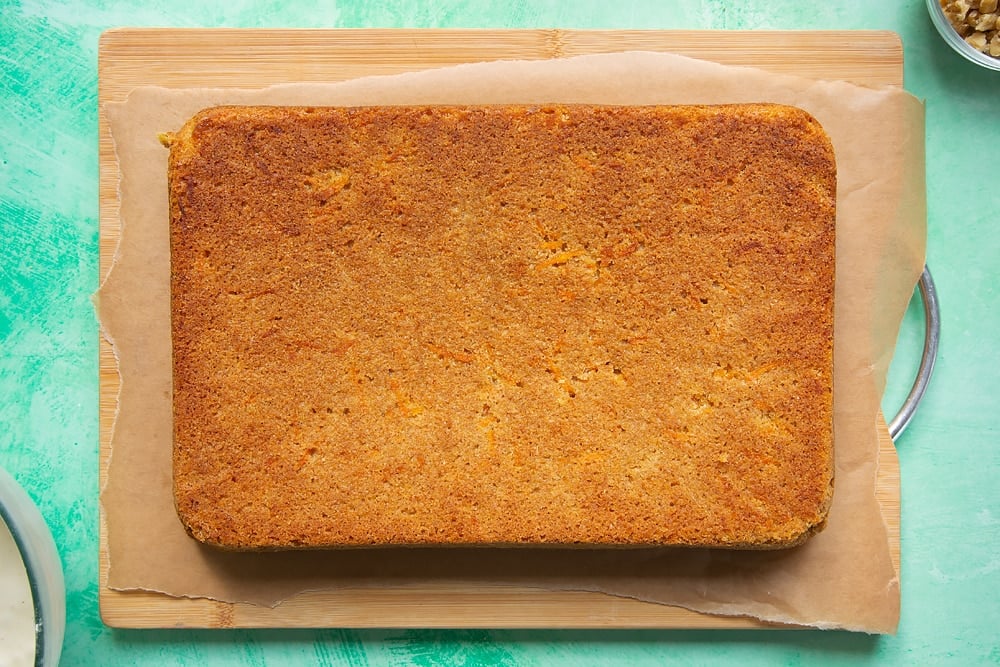 Once cooled the carrot cake tray bake is moved onto a serving board. 