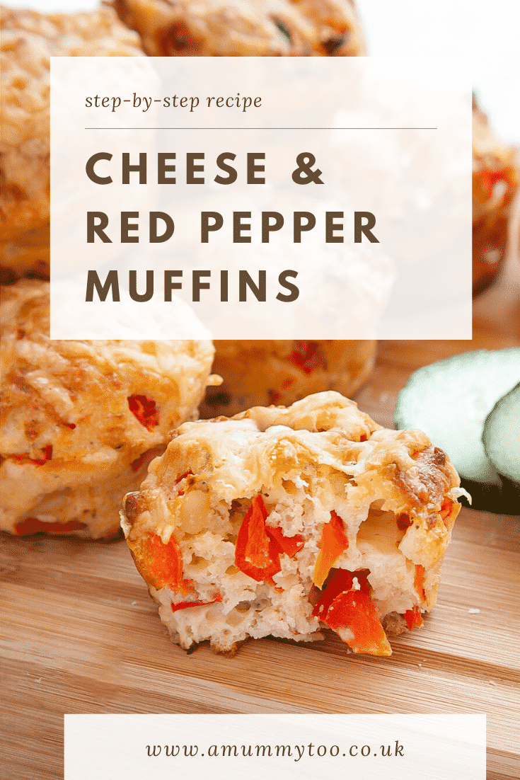 Close up of the inside of a cheese and red pepper muffins. In the background there's a pile of additional cheese and red pepper muffins. At the top of the image thre's some text describing the image for Pinterest.