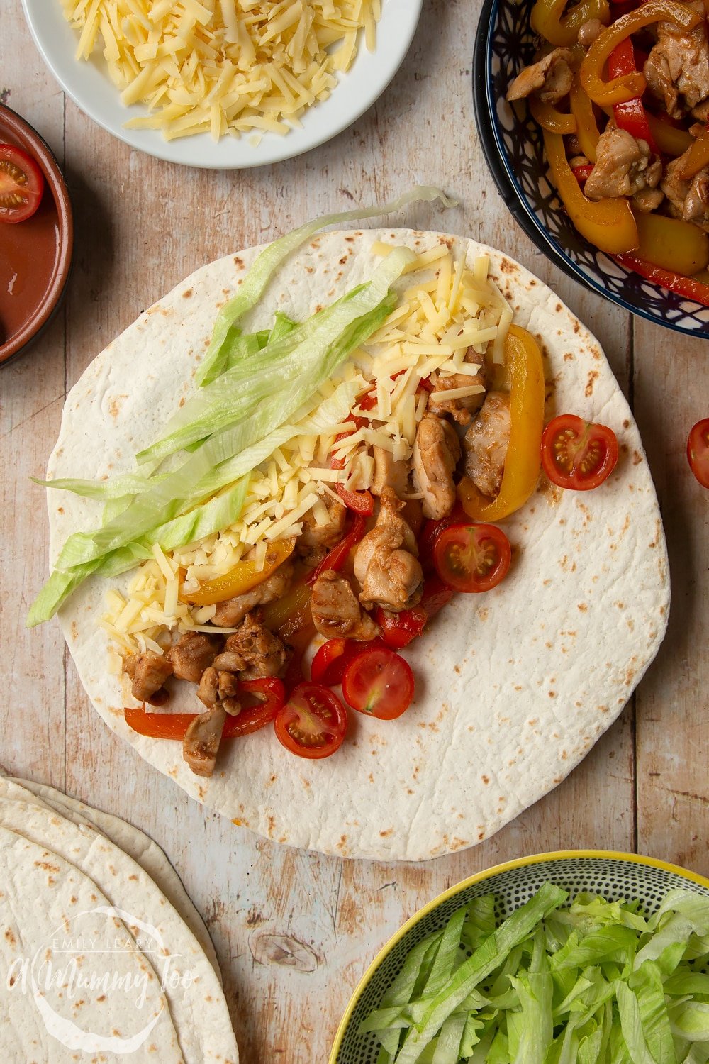 An open wrap demonstrating how to create mild chicken fajitas for kids