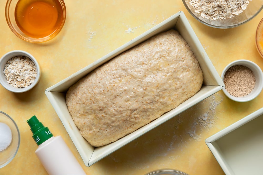 Overhead shot of dough in a loaf tin