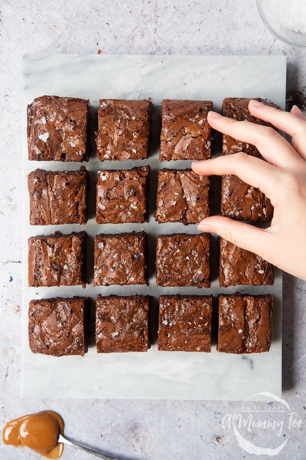 Finished slices of gooey salted caramel brownies ready to be  shared and enjoyed.