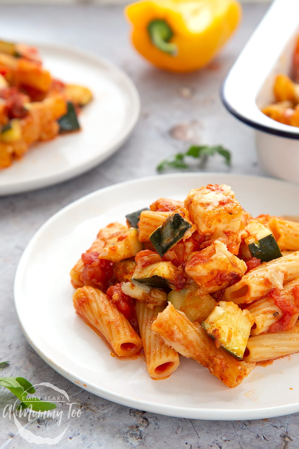 One plate of the incredible halloumi pasta bake taken from the side to show the texture of the meal.