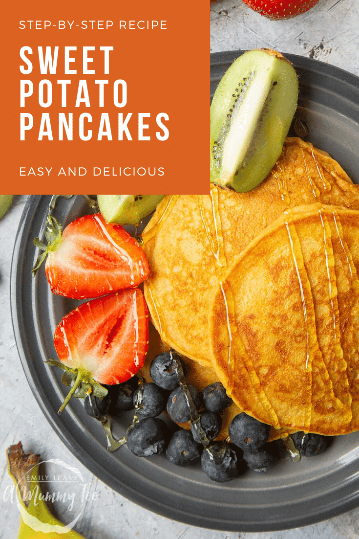 Overhead shot of sweet potoato pancakes on a black plate with a side of fruit. At the top right hand side of the image there's some text describing the image for Pinterest. 